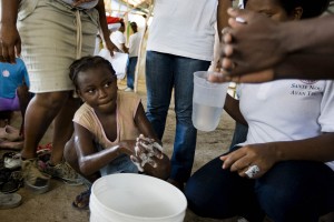 A child washes her hands during educational activities held for the Global Handwashing day at a refugee camp in Port au Prince. Millions of children around the world are getting ready for the third annual Global Handwashing day, to be held globally on October 15 2010.